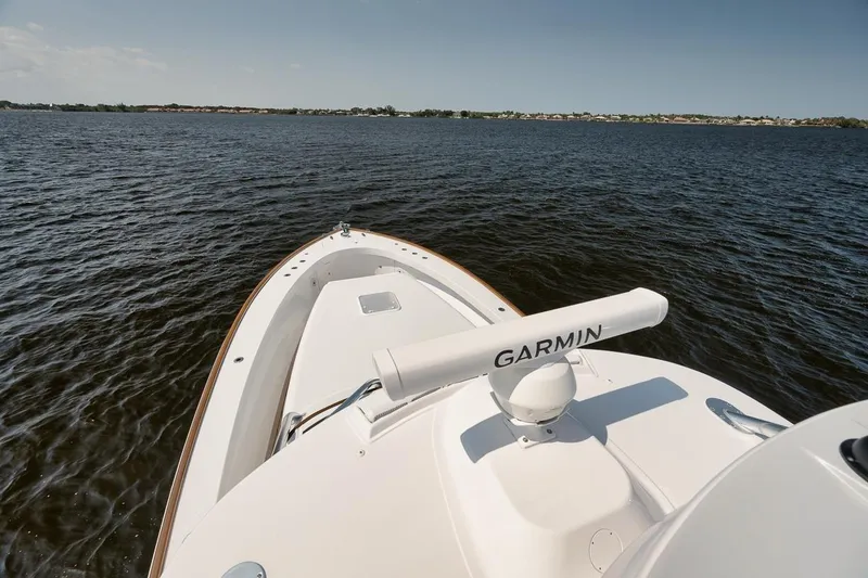 Slide: The Image of 2024 Gamefisherman 49 boat with Garmin equipment on open water. - 35