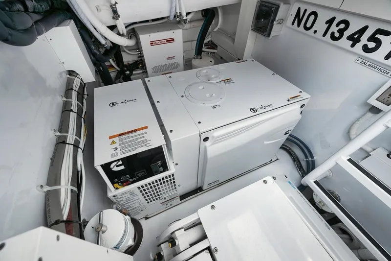 Slide: The Image of Engine room of 2024 Gamefisherman 49 boat with generator and equipment. - 47