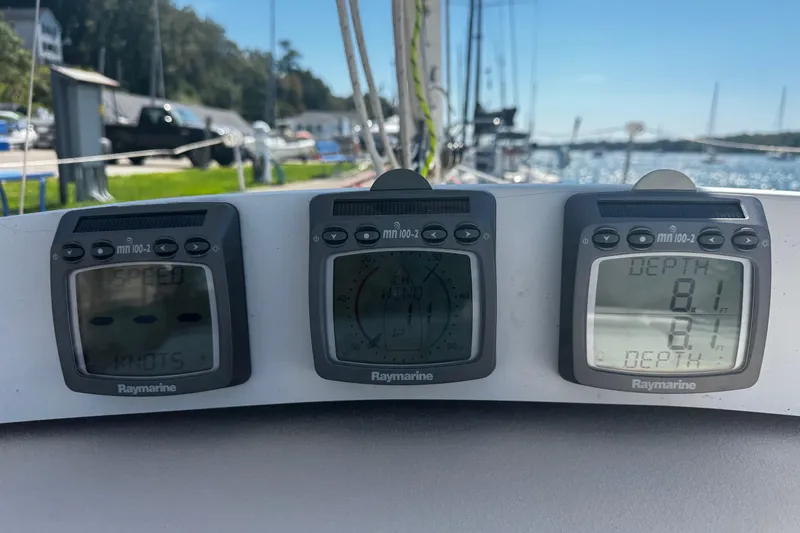 Slide: The Image of Raymarine instruments on a 2003 J Boats J/105 sailboat, displaying speed and depth. - 10
