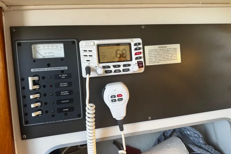 Slide: The Image of Electrical panel and radio equipment on a 2003 J Boats J/105 sailboat. - 16