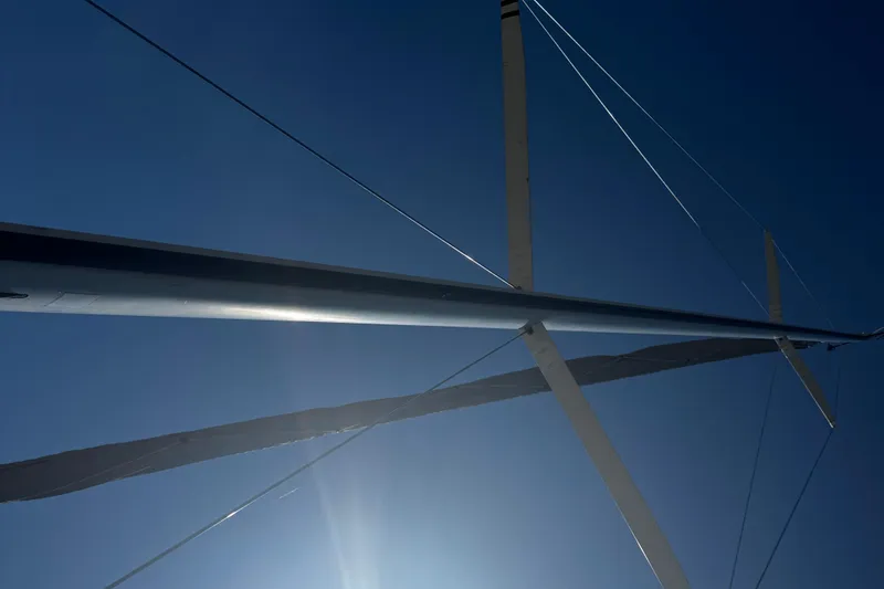 Slide: The Image of Sailboat mast and rigging of 2003 J Boats J/105 against clear blue sky. - 31