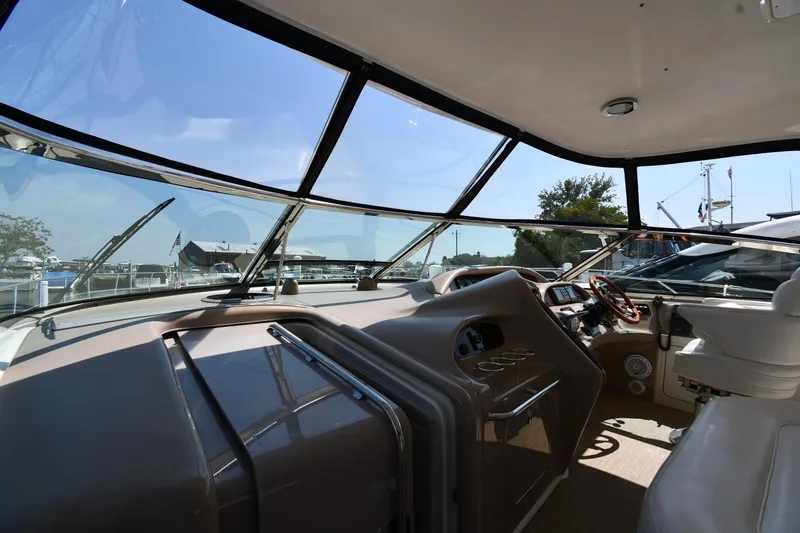 Slide: The Image of Interior view of 2001 Sea Ray 540 Sundancer yacht cockpit. - 10
