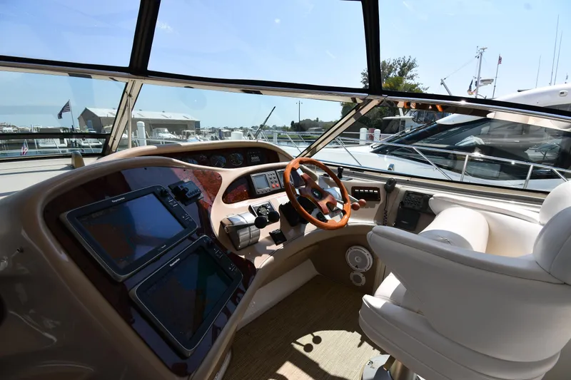 Slide: The Image of Helm of 2001 Sea Ray 540 Sundancer yacht with modern navigation equipment. - 11
