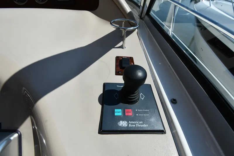 Slide: The Image of Control panel of a 2001 Sea Ray 540 Sundancer with American Bow Thruster joystick. - 15