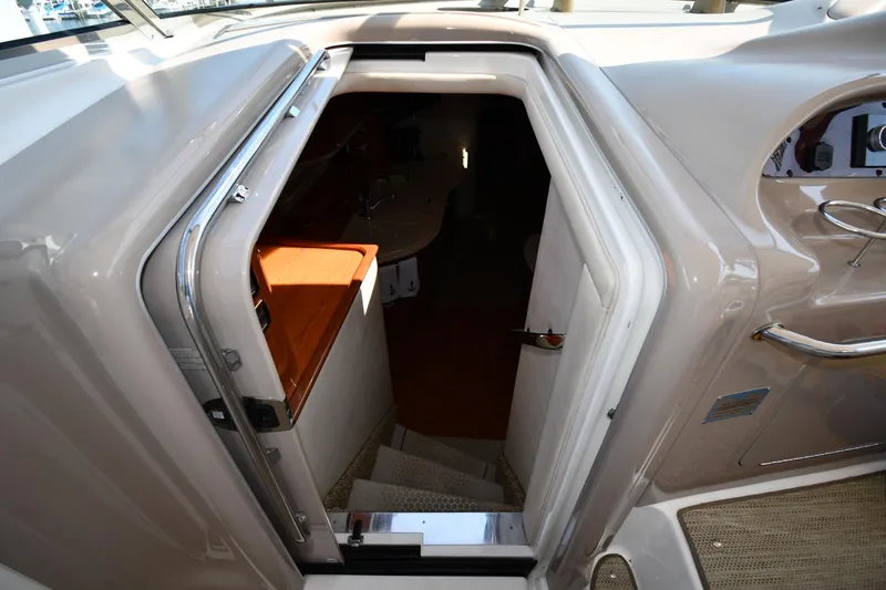 Slide: The Image of Interior entrance of 2001 Sea Ray 540 Sundancer yacht, showing stairs and cabin access. - 33