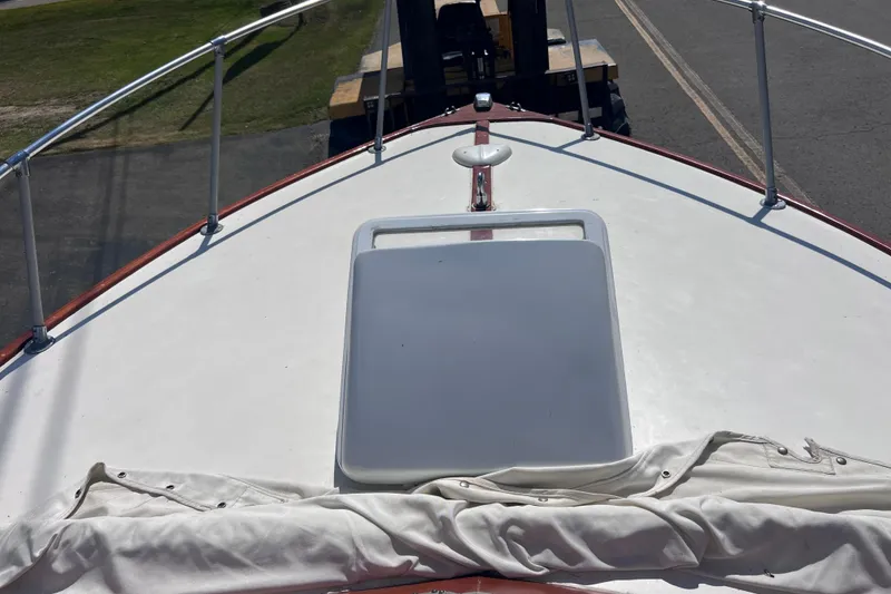 Slide: The Image of 1964 Chris Craft Sea Skiff Sportsman boat deck with railing and hatch. - 20