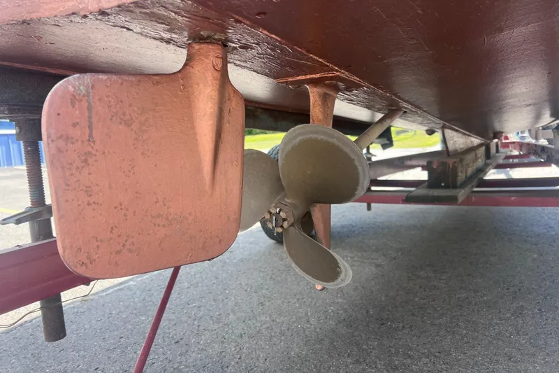 Slide: The Image of 1964 Chris Craft Sea Skiff Sportsman boat propeller and rudder detail. - 7