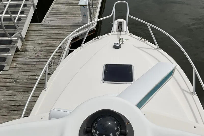Slide: The Image of 2003 Albemarle 27 Express Fisherman boat docked at marina, view from helm. - 29