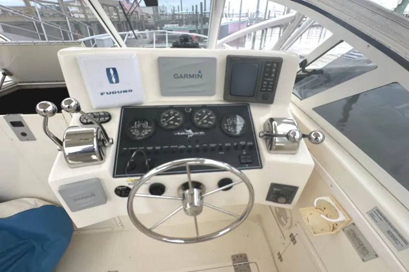 Slide: The Image of Control panel of 2003 Albemarle 27 Express Fisherman with Garmin and Furuno equipment. - 7