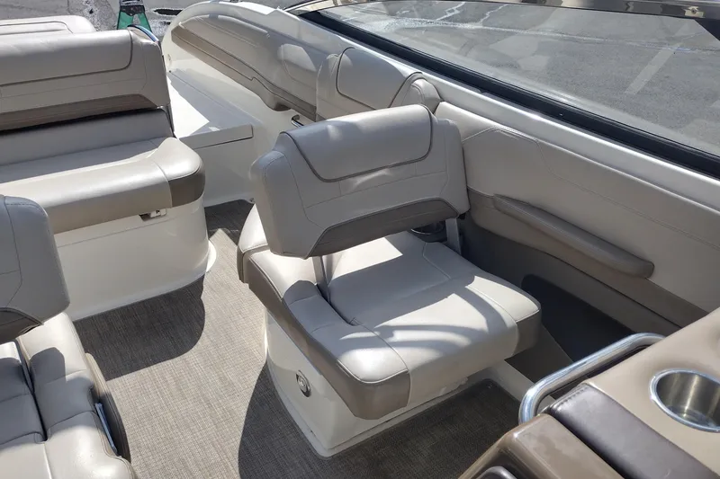 Slide: The Image of 2015 Formula 240 Bowrider interior with beige seating and modern design. - 20