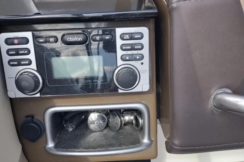 Slide: The Image of Clarion audio system in 2015 Formula 240 Bowrider boat dashboard. - 29