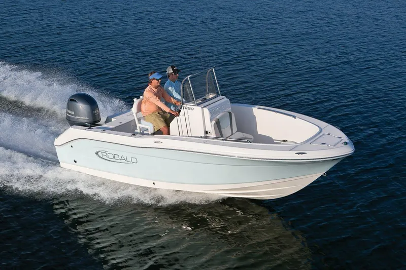 Slide: The Image of 2026 Robalo R180 Center Console boat cruising on open water. - 14
