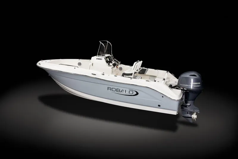 Slide: The Image of 2026 Robalo R180 Center Console boat with Yamaha outboard motor on black background. - 2