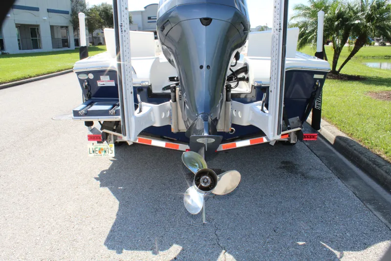 Slide: The Image of 2017 Pathfinder 2500 Hybrid boat with outboard motor on trailer. - 16