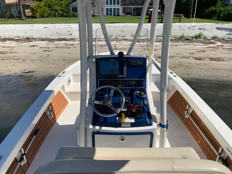 Slide: The Image of 2017 Pathfinder 2500 Hybrid boat interior with seating and Yamaha 300 engine. - 42