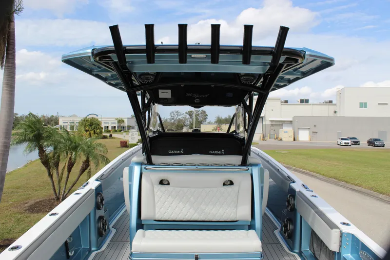Slide: The Image of 2021 Nor-Tech 390 Sport Center Console boat with sleek seating and modern design. - 30