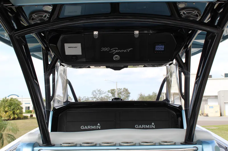 Slide: The Image of 2021 Nor-Tech 390 Sport Center Console with Garmin electronics and sleek design. - 32