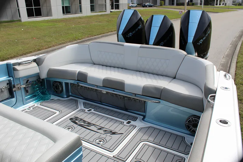 Slide: The Image of 2021 Nor-Tech 390 Sport Center Console with triple engines and spacious seating area. - 38