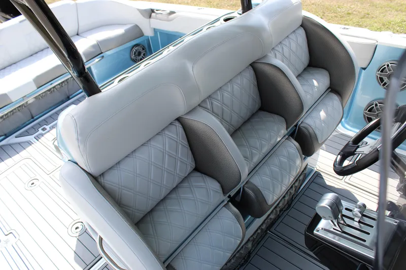 Slide: The Image of 2021 Nor-Tech 390 Sport Center Console interior with luxurious seating and modern controls. - 47