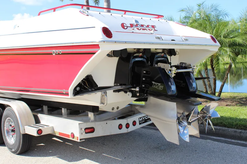 Slide: The Image of 2007 Fountain 42 Lightning boat on trailer, rear view with dual propellers. - 13