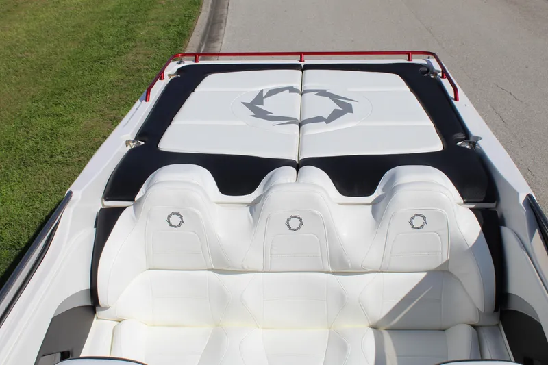 Slide: The Image of 2007 Fountain 42 Lightning boat interior with white leather seats and logo design. - 24