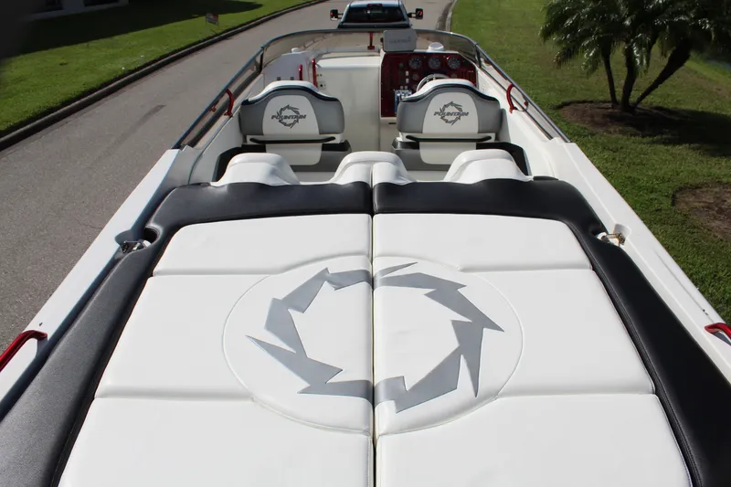 Slide: The Image of 2007 Fountain 42 Lightning boat interior with white seating and logo design. - 28