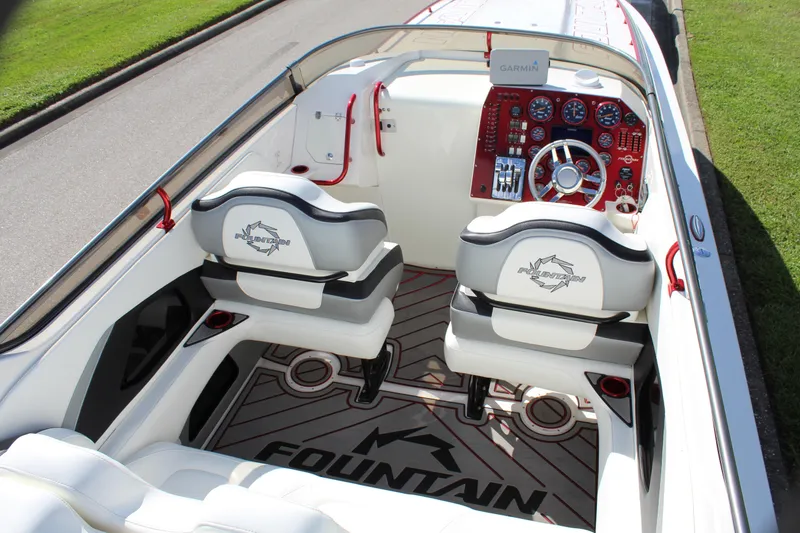Slide: The Image of 2007 Fountain 42 Lightning boat interior with sleek dashboard and comfortable seating. - 30