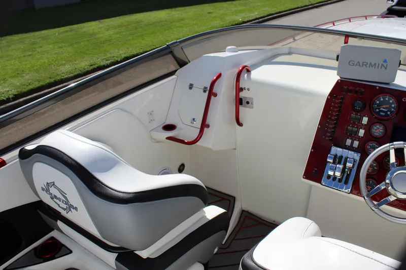 Slide: The Image of 2007 Fountain 42 Lightning boat cockpit with Garmin navigation system and sleek seating. - 36
