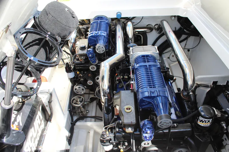 Slide: The Image of 2007 Fountain 42 Lightning engine compartment with dual high-performance engines. - 38