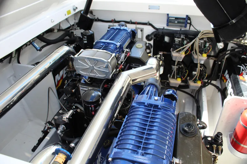 Slide: The Image of Engine compartment of 2007 Fountain 42 Lightning boat with blue components. - 40