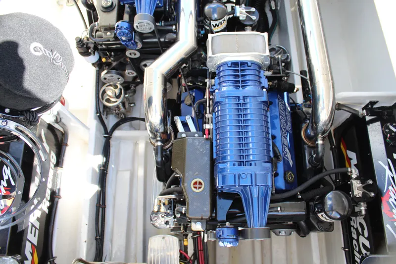 Slide: The Image of 2007 Fountain 42 Lightning engine with blue components and chrome accents. - 42