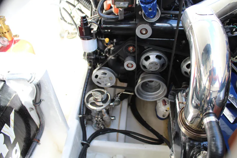 Slide: The Image of 2007 Fountain 42 Lightning engine compartment with visible components and wiring. - 45