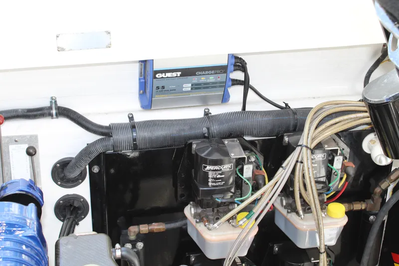 Slide: The Image of Engine compartment of 2007 Fountain 42 Lightning boat with wiring and components. - 48