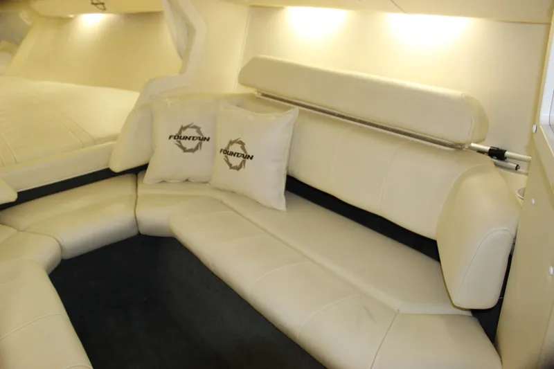 Slide: The Image of 2007 Fountain 42 Lightning interior with white leather seating and branded cushions. - 55