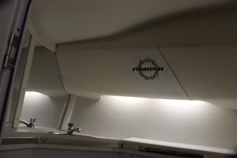 Slide: The Image of 2007 Fountain 42 Lightning interior with logo and sleek design elements. - 59