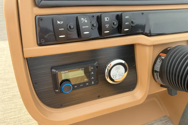 Slide: The Image of Control panel of 2026 Godfrey SWEETWATER 2286 SFL with switches and Clarion audio system. - 12