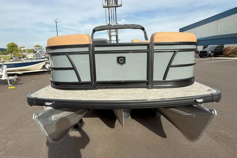 Slide: The Image of 2026 Godfrey SWEETWATER 2286 SFL pontoon boat, rear view in a parking lot. - 4