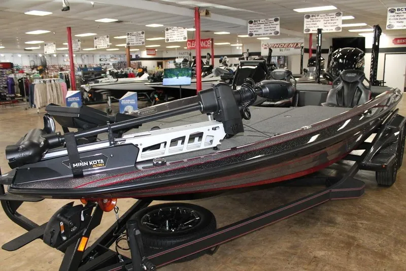 Slide: The Image of 2025 Skeeter FXR20 Limited boat with Minn Kota Ultrex motor in showroom. - 7