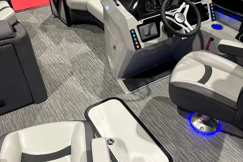 Slide: The Image of Interior of 2026 Viaggio Lago X20U boat with modern seating and illuminated controls. - 12