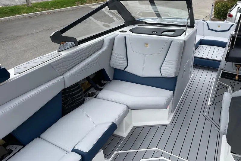Slide: The Image of 2026 Nautique Super Air Nautique G25 interior with sleek seating and modern design. - 10