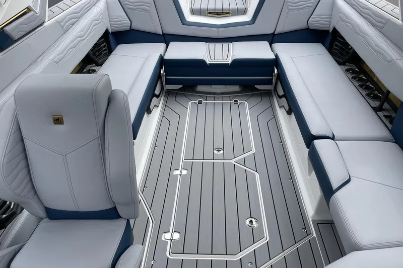 Slide: The Image of 2026 Nautique Super Air Nautique G25 interior with luxurious seating and sleek design. - 12