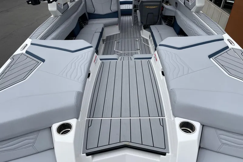 Slide: The Image of 2026 Nautique Super Air Nautique G25 interior with sleek seating and modern design. - 4