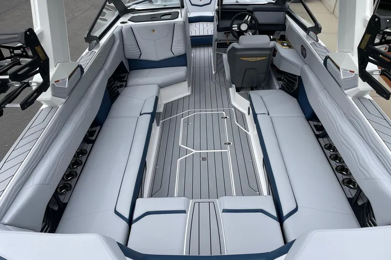 Slide: The Image of 2026 Nautique Super Air Nautique G25 interior with spacious seating and modern design. - 5