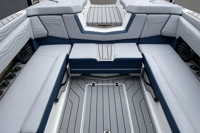 Slide: The Image of 2026 Nautique Super Air Nautique G25 interior with luxurious seating and modern design. - 8