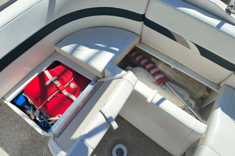 Slide: The Image of Dashboard of a 2003 Formula 260 Sun Sport boat with steering wheel and gauges. - 12