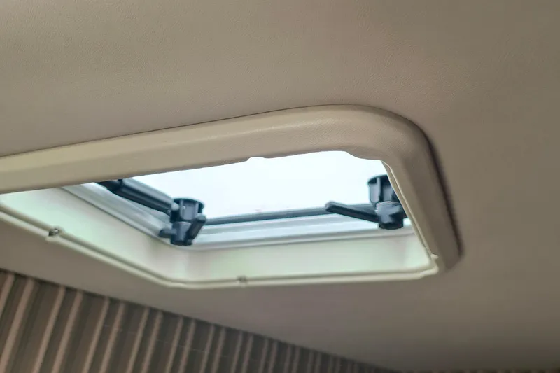 Slide: The Image of Boat cabin hatch of a 2003 Formula 260 Sun Sport, partially open. - 5