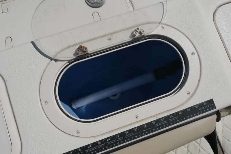 Slide: The Image of Livewell compartment on a 2022 Carolina Skiff 23 Ultra Elite boat. - 24