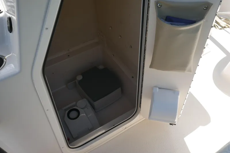 Slide: The Image of Interior storage compartment of 2022 Carolina Skiff 23 Ultra Elite boat. - 28
