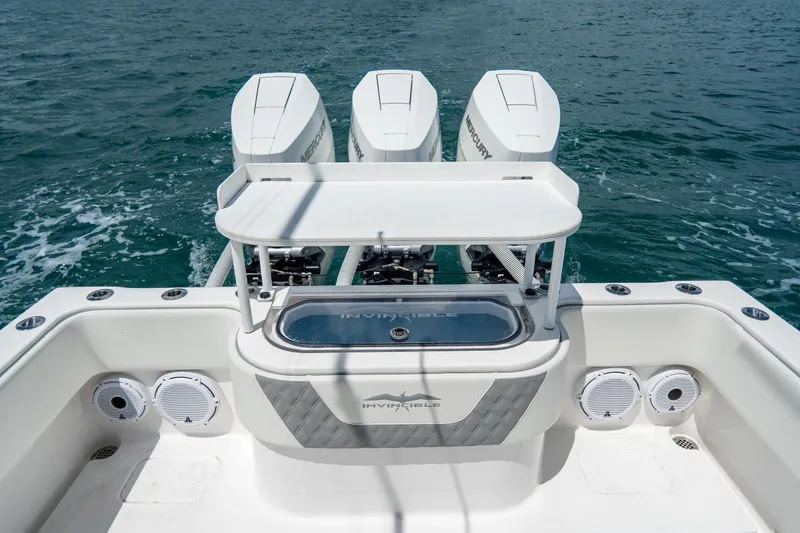 Slide: The Image of 2023 Invincible 36 Open Fisherman boat with triple Mercury engines on the ocean. - 18