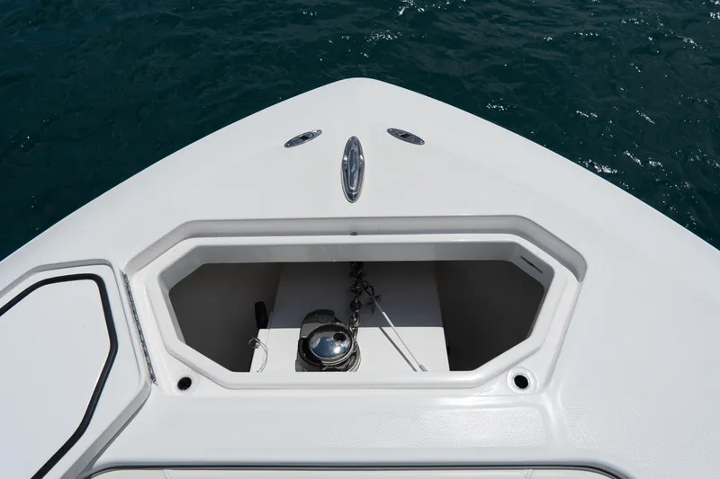 Slide: The Image of Bow of 2023 Invincible 36 Open Fisherman with anchor storage, on calm water. - 7